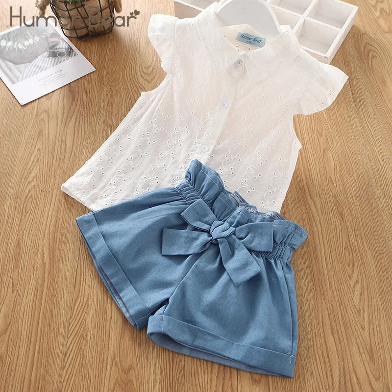 Conjunto Bebê Menina 2 Peças Blusa Branca Bordada  e Short Azul com Laço