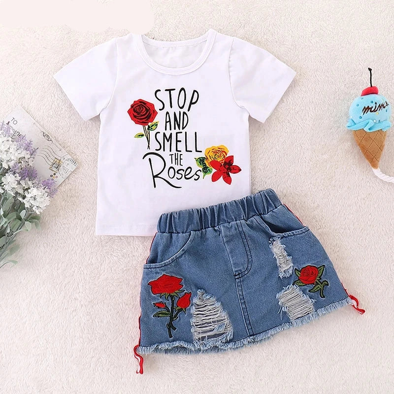Conjunto Infantil Menina Camiseta Manga Curta Estampa Frase e Rosas + Saia Jeans 2 Peças