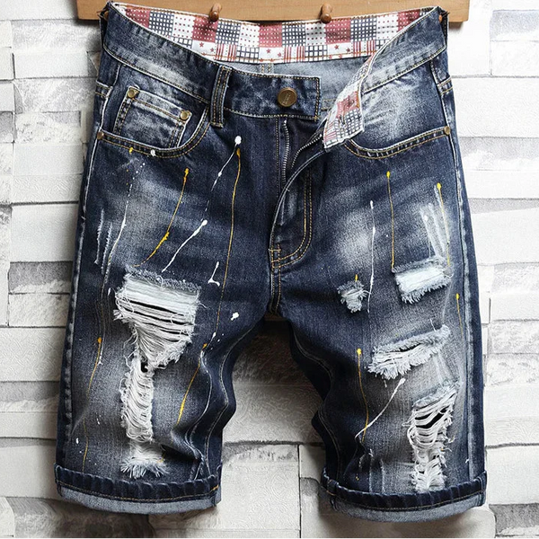 Bermuda Jeans Infantil Destroyed Lavagem Escura com Rasgos Desfiados e Barra Dobrada