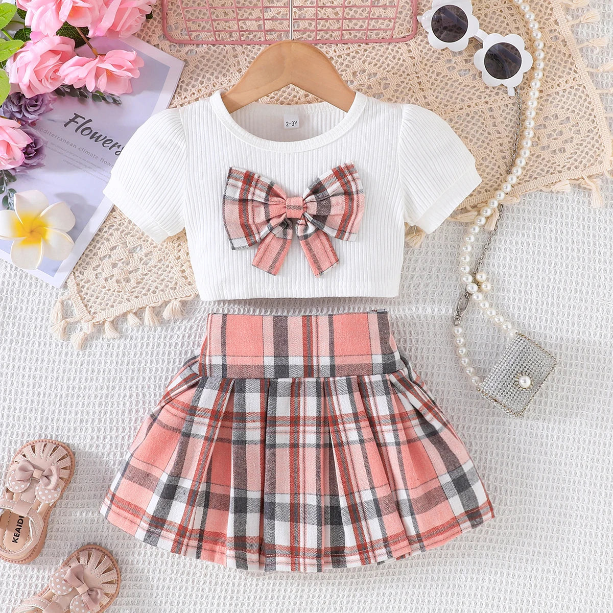 Conjunto Infantil Menina Blusa Cropped Canelada com Laço Xadrez + Saia Xadrez com Botões 2 Peças