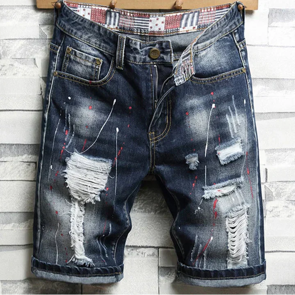 Bermuda Jeans Infantil Destroyed Lavagem Escura com Rasgos Desfiados e Barra Dobrada