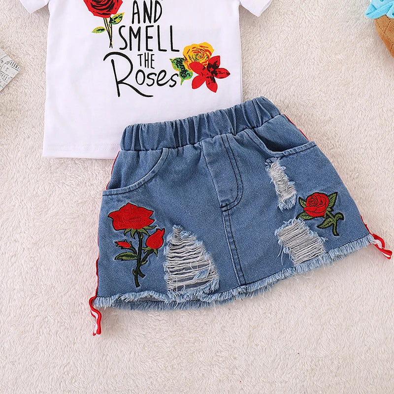 Conjunto Infantil Menina Camiseta Manga Curta Estampa Frase e Rosas + Saia Jeans 2 Peças