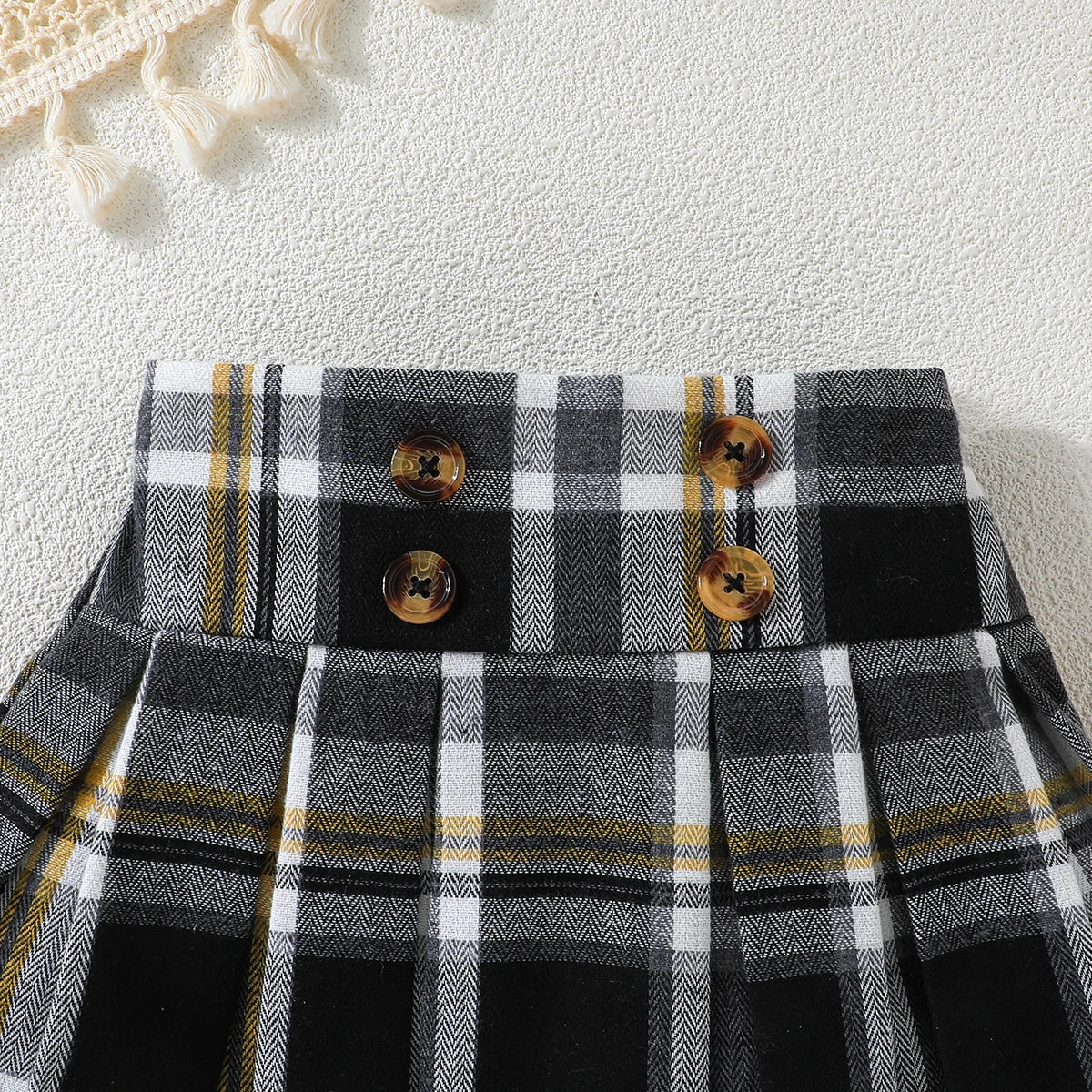 Conjunto Infantil Menina Blusa Cropped Canelada com Laço Xadrez + Saia Xadrez com Botões 2 Peças