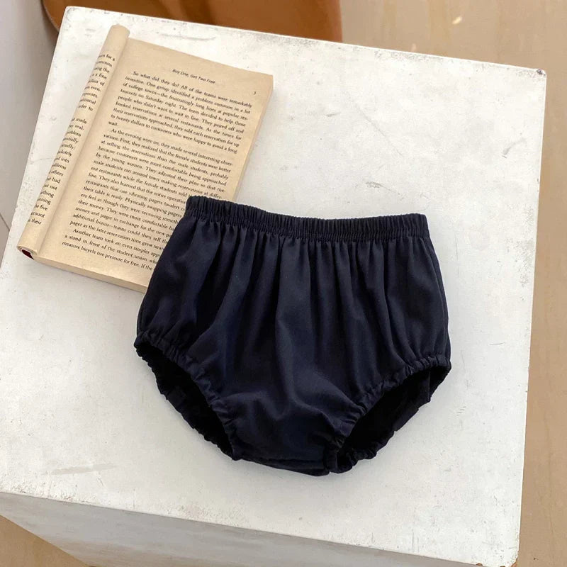 Conjunto Bebê Menina 2 Peças Blusa Branca Estampada Florzinhas E Short Bloomer Preto