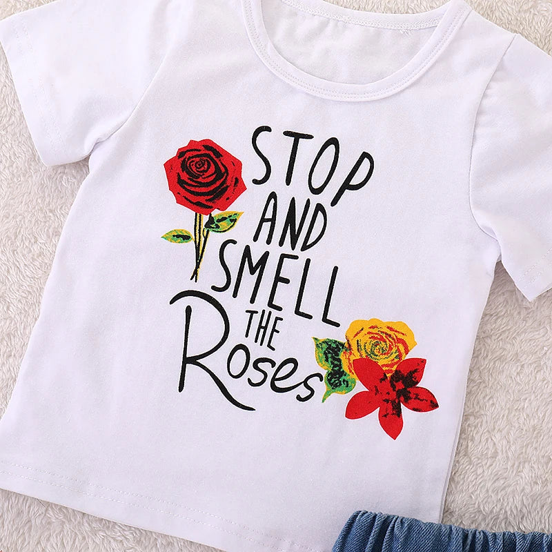 Conjunto Infantil Menina Camiseta Manga Curta Estampa Frase e Rosas + Saia Jeans 2 Peças